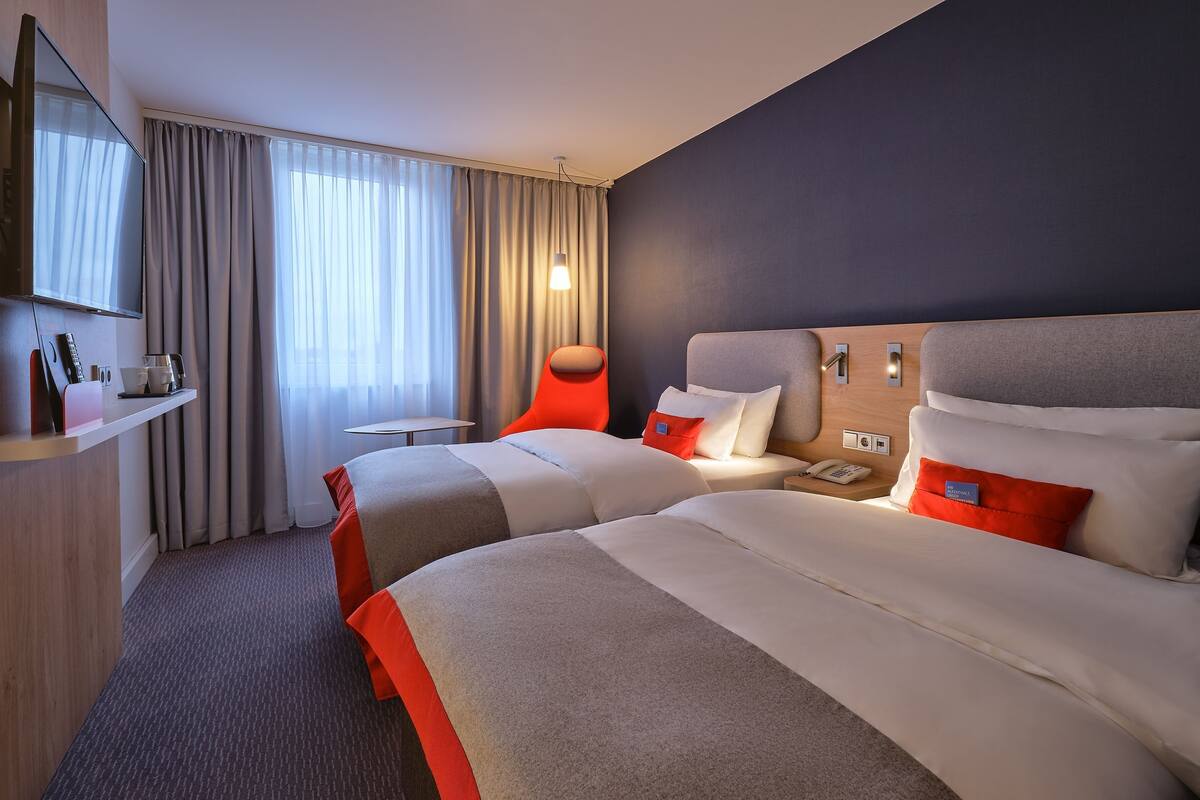 standard room, 2 single beds | hypo-allergenic bedding, desk, blackout curtains, soundproofing