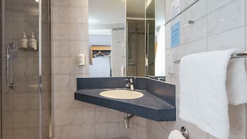 Shower, eco-friendly toiletries, hair dryer, towels