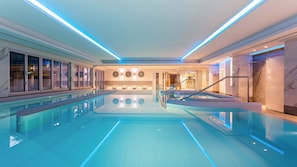 Indoor pool, outdoor pool, pool umbrellas, pool loungers