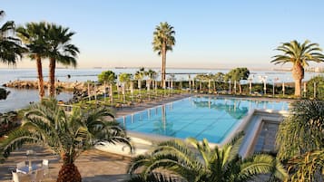 Indoor pool, outdoor pool, pool umbrellas, sun loungers