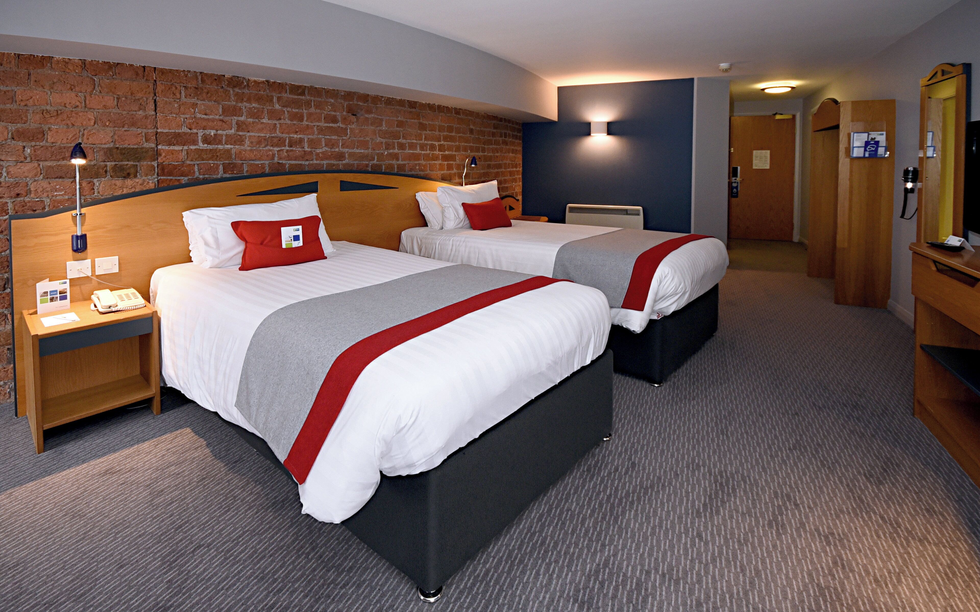 Desk, blackout curtains, free cots/infant beds, free WiFi