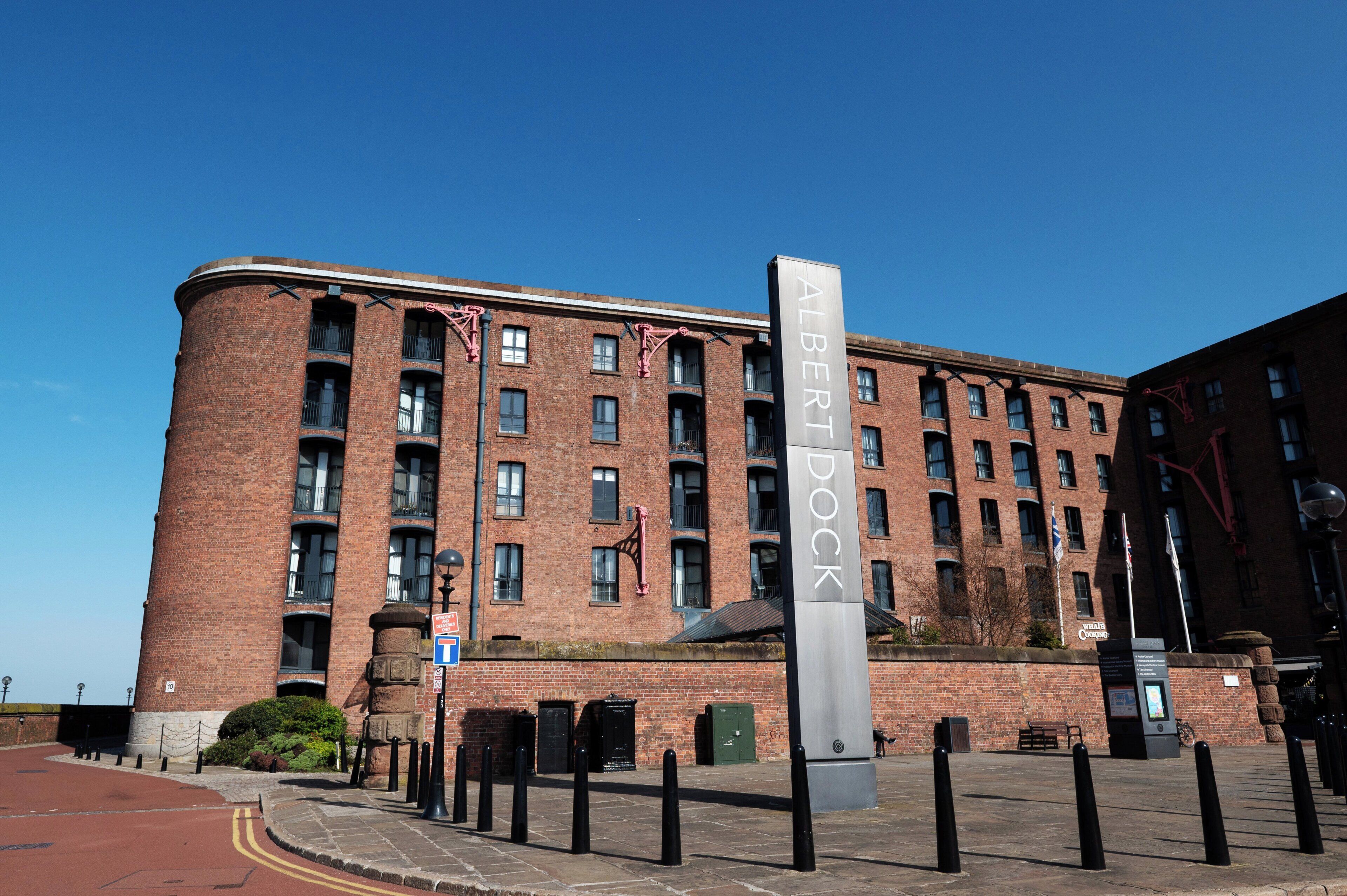 A brick building with a sign reading 'Albert Dock.'
