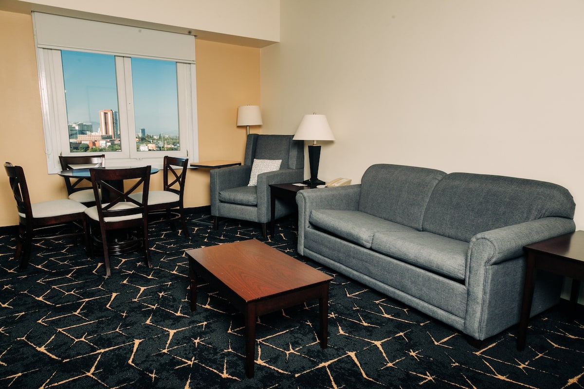 Suite, 1 King Bed | 1 bedroom, in-room safe, desk, iron/ironing board