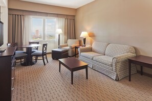 Suite, 1 King Bed | In-room safe, desk, iron/ironing board, free cribs/infant beds