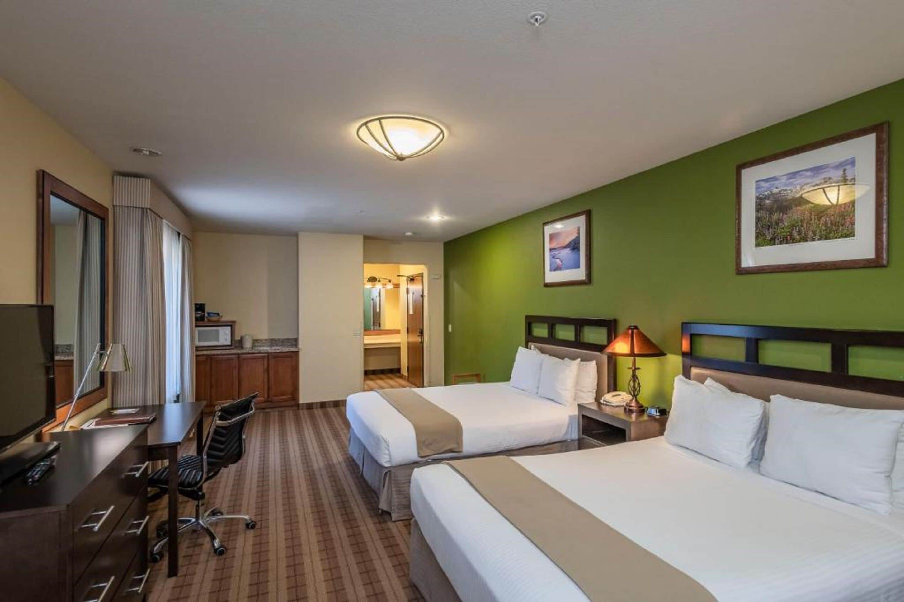 executive room, 2 queen beds | desk, iron/ironing board, free wifi, bed sheets