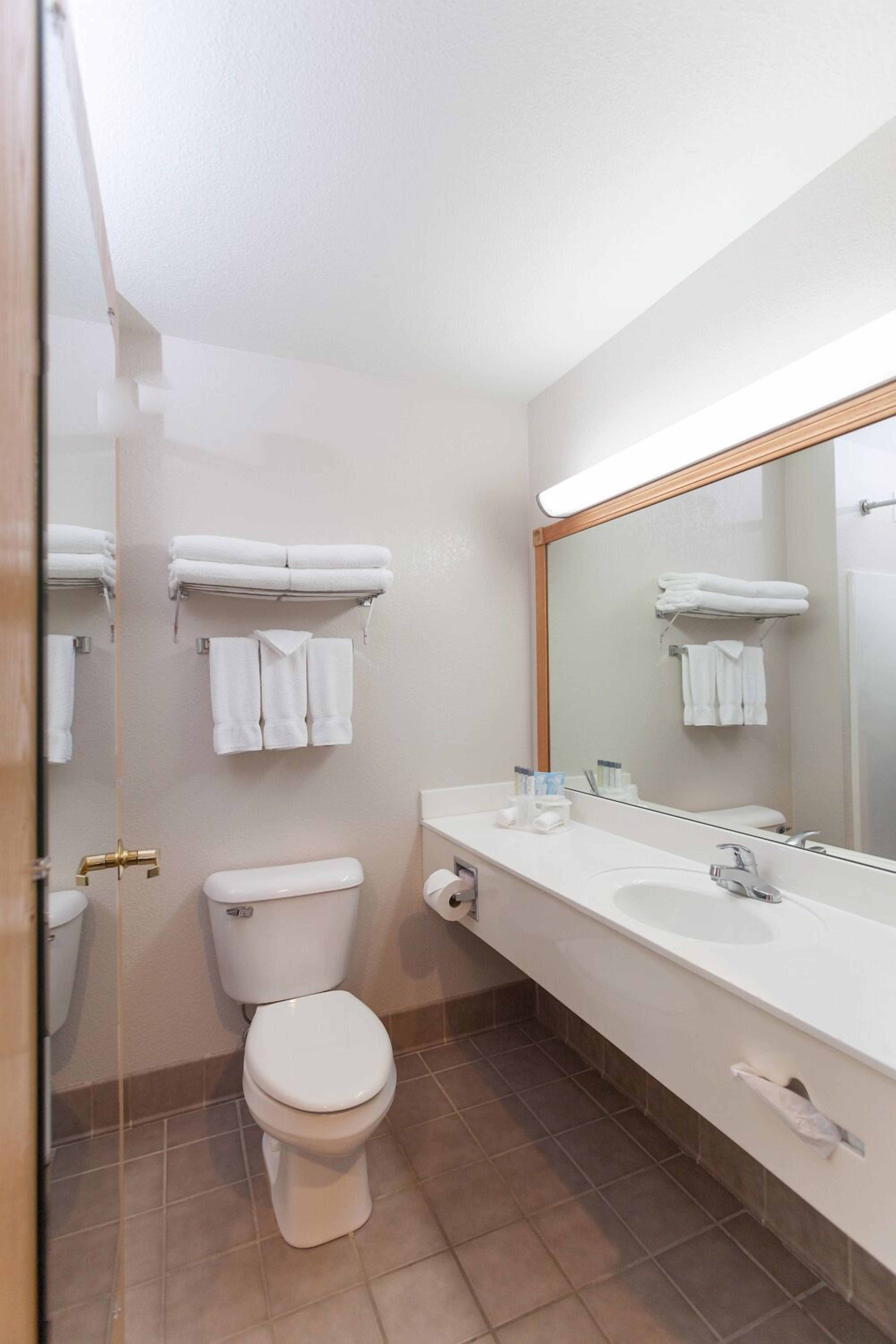 standard room, 2 queen beds | bathroom | shower, free toiletries, hair dryer