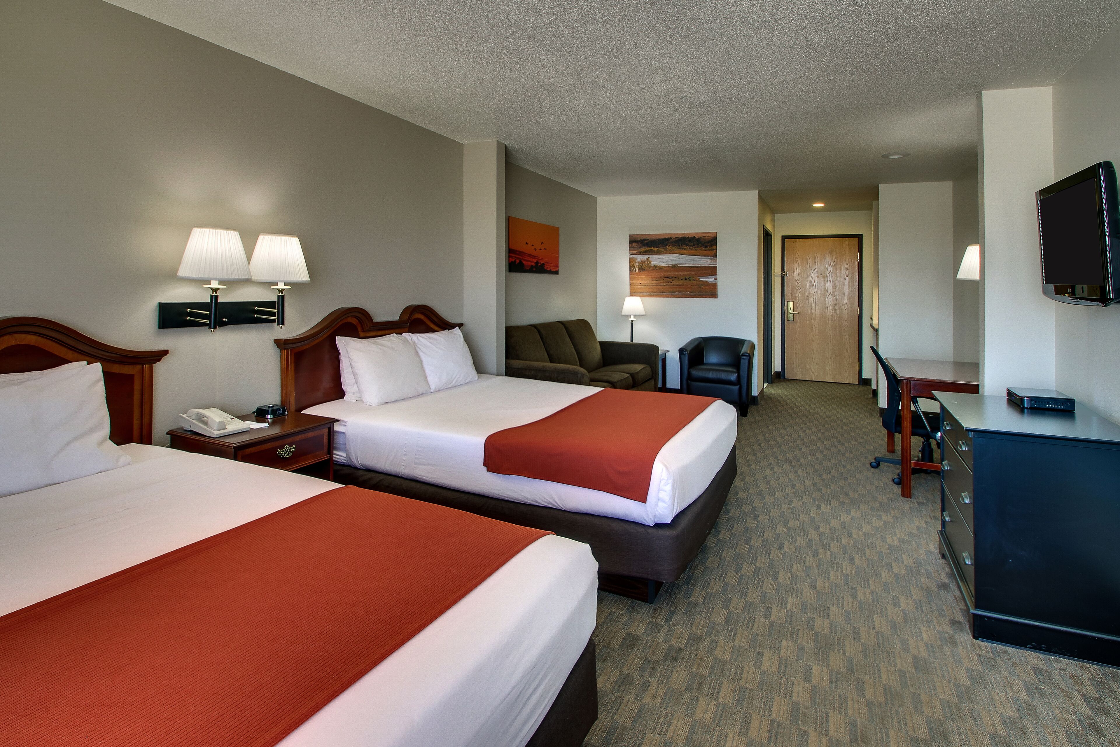 suite, 2 queen beds (two queen bedded suite) | in-room safe, desk, iron/ironing board, free wifi