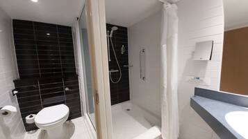 Shower, eco-friendly toiletries, hair dryer, towels