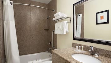 Combined shower/bathtub, hair dryer, towels, soap