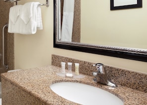 Combined shower/tub, hair dryer, towels, soap