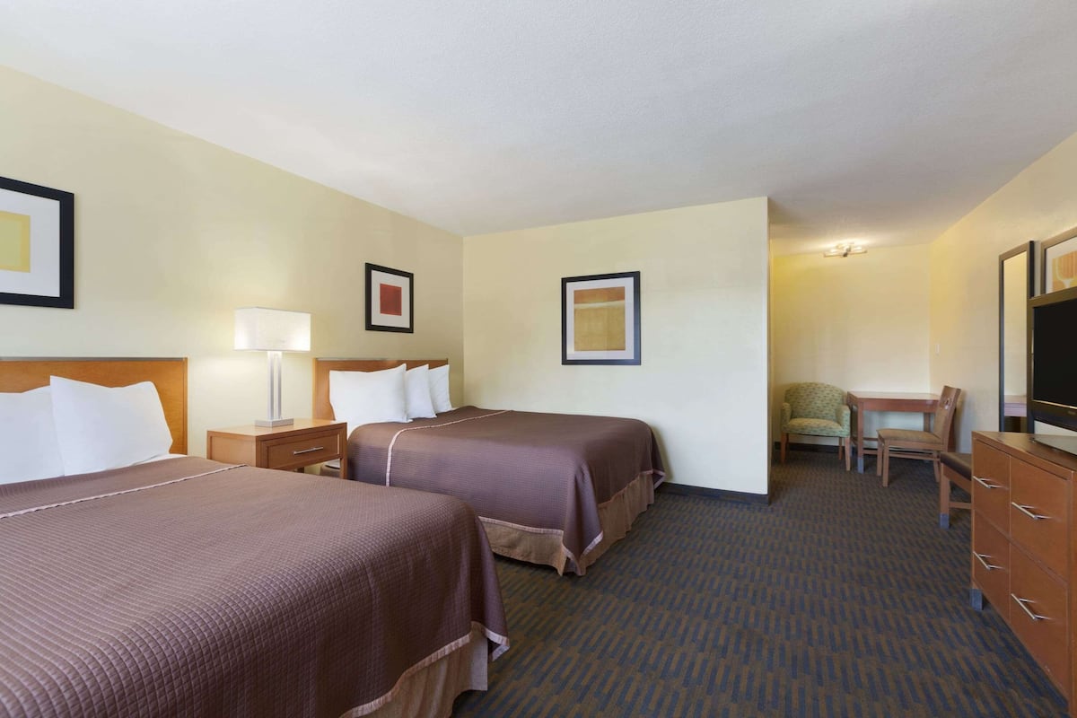 room, 2 queen beds, non smoking, refrigerator & microwave | in-room safe, desk, free cots/infant beds, rollaway beds