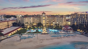 A resort with a large pool, beach area, and multiple buildings. - British Colonial - Nassau  (Nassau)