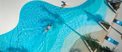 2 outdoor pools, open 6:00 AM to 5:30 PM, cabanas (surcharge)