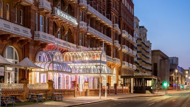 A historic building with ornate balconies and a marquee sign. - DoubleTree by Hilton Brighton Metropole (Brighton)