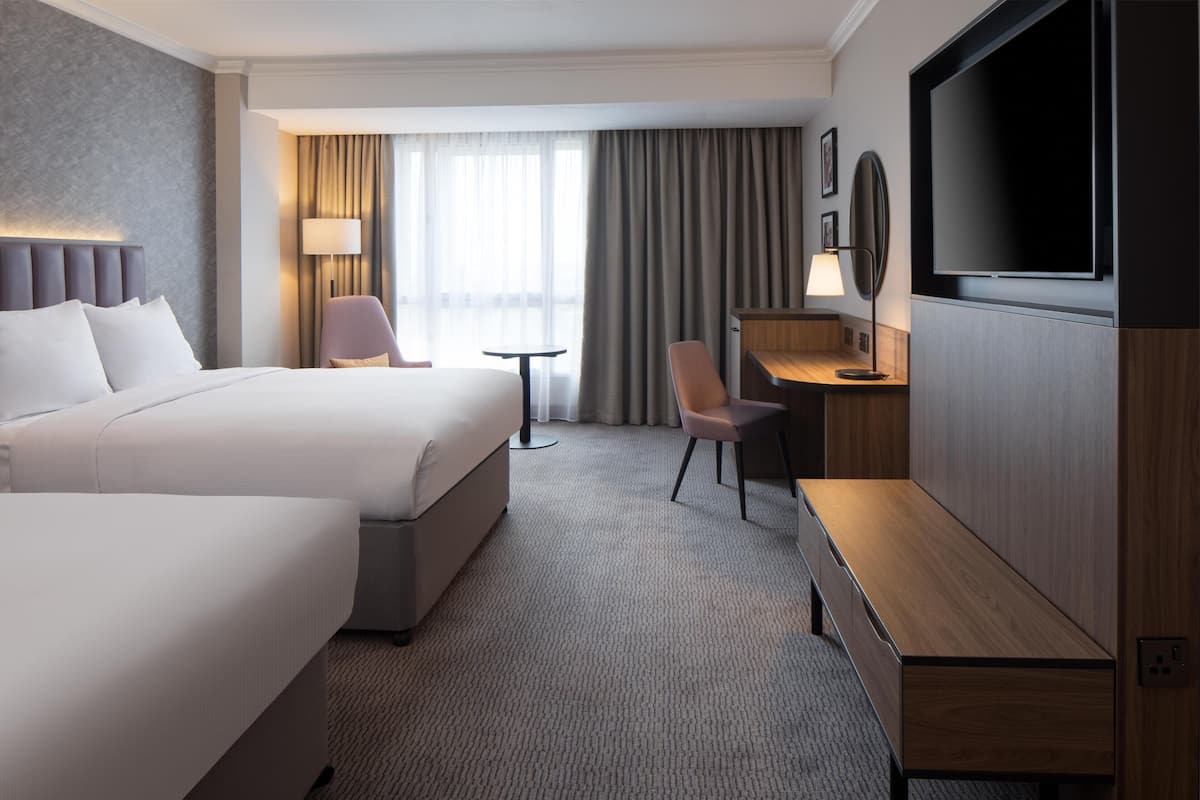 Deluxe Room, 2 Queen Beds, Non Smoking | Hypo-allergenic bedding, in-room safe, desk, blackout drapes