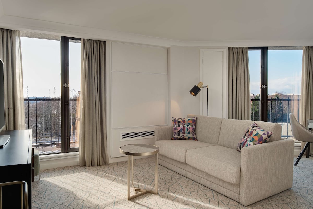 junior suite, 1 king bed, club lounge access | living area | 55-inch flat-screen tv with cable channels, tv