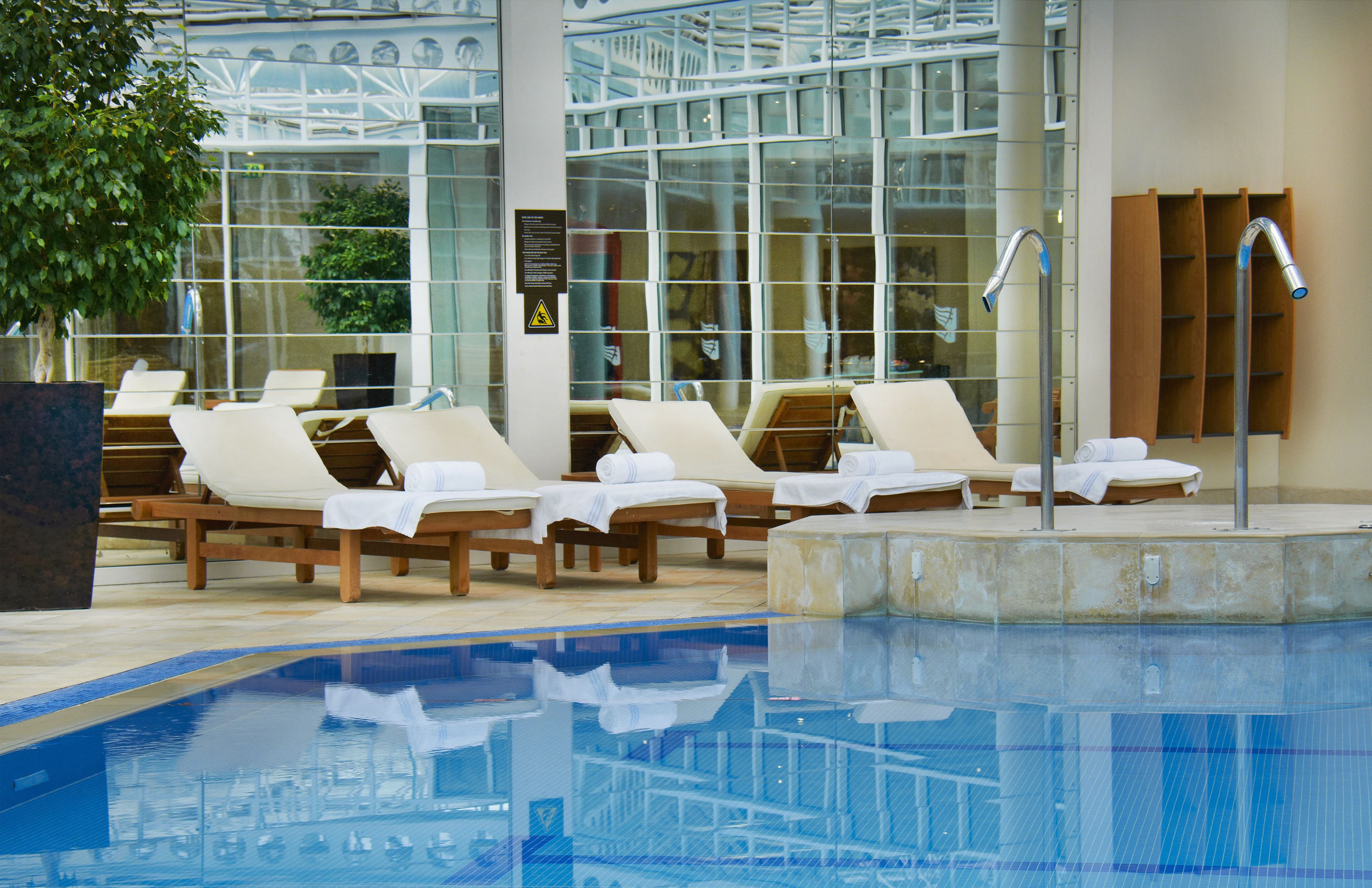 indoor pool, open 6:00 am to 10:00 pm, lifeguards on site