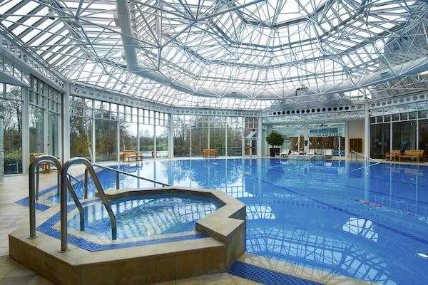 Indoor pool, open 6:00 AM to 10:00 PM, lifeguards on site