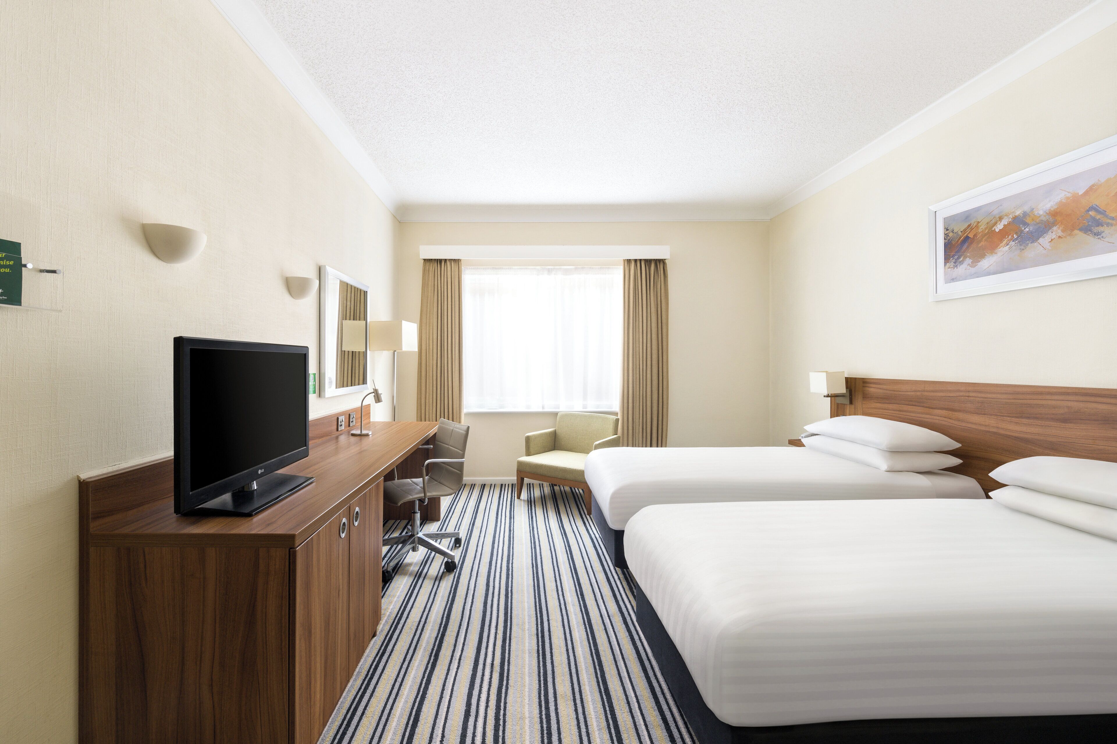 Desk, blackout curtains, iron/ironing board, free cots/infant beds