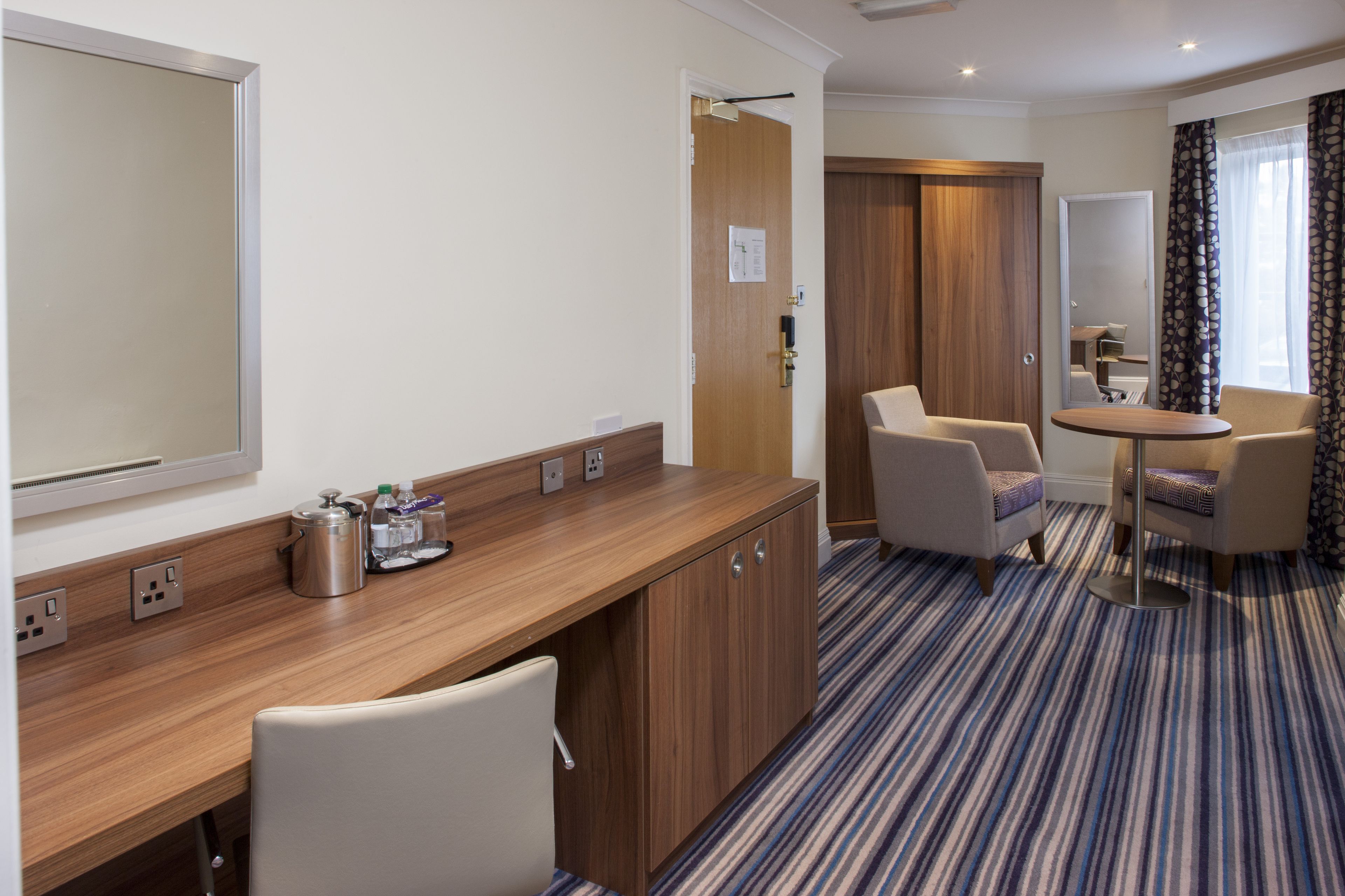 suite, 1 king bed, balcony | 1 bedroom, desk, blackout curtains, iron/ironing board