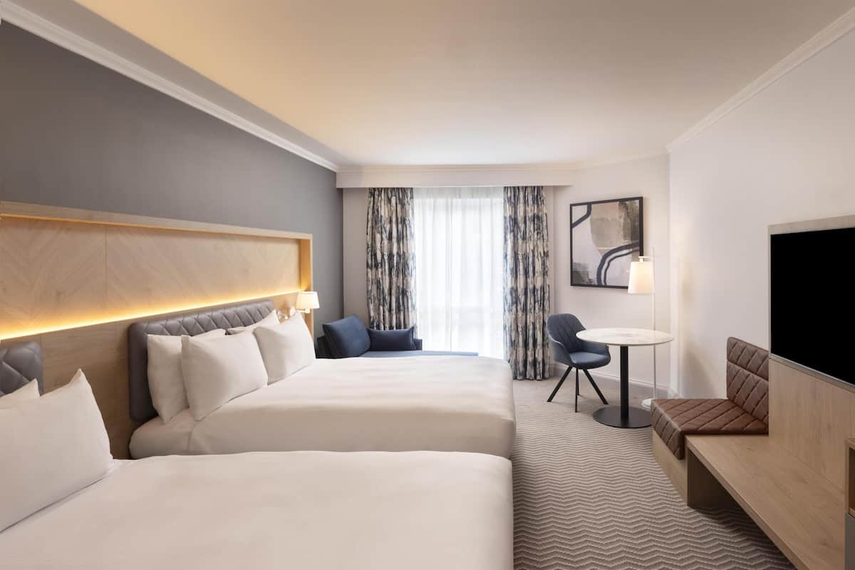 Deluxe Room, 2 Queen Beds | In-room safe, desk, laptop workspace, blackout drapes