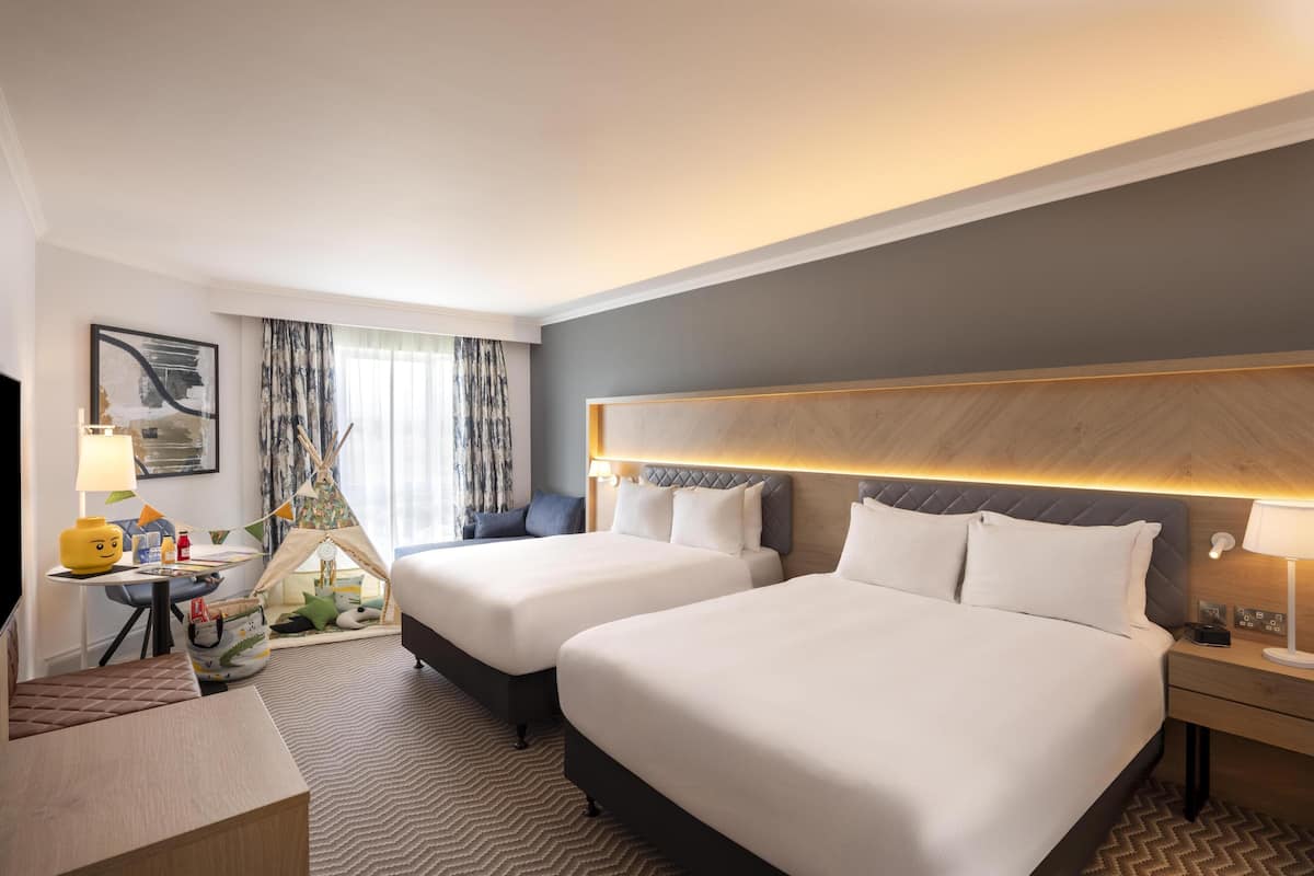 Deluxe Room, 2 Queen Beds | In-room safe, desk, laptop workspace, blackout drapes