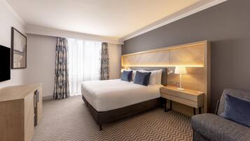 Suite, 1 King Bed | In-room safe, desk, laptop workspace, blackout curtains