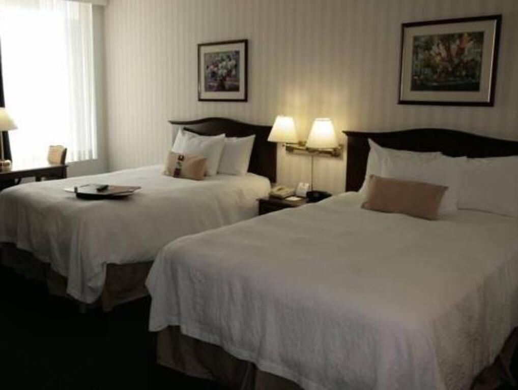 Premium bedding, desk, blackout drapes, iron/ironing board