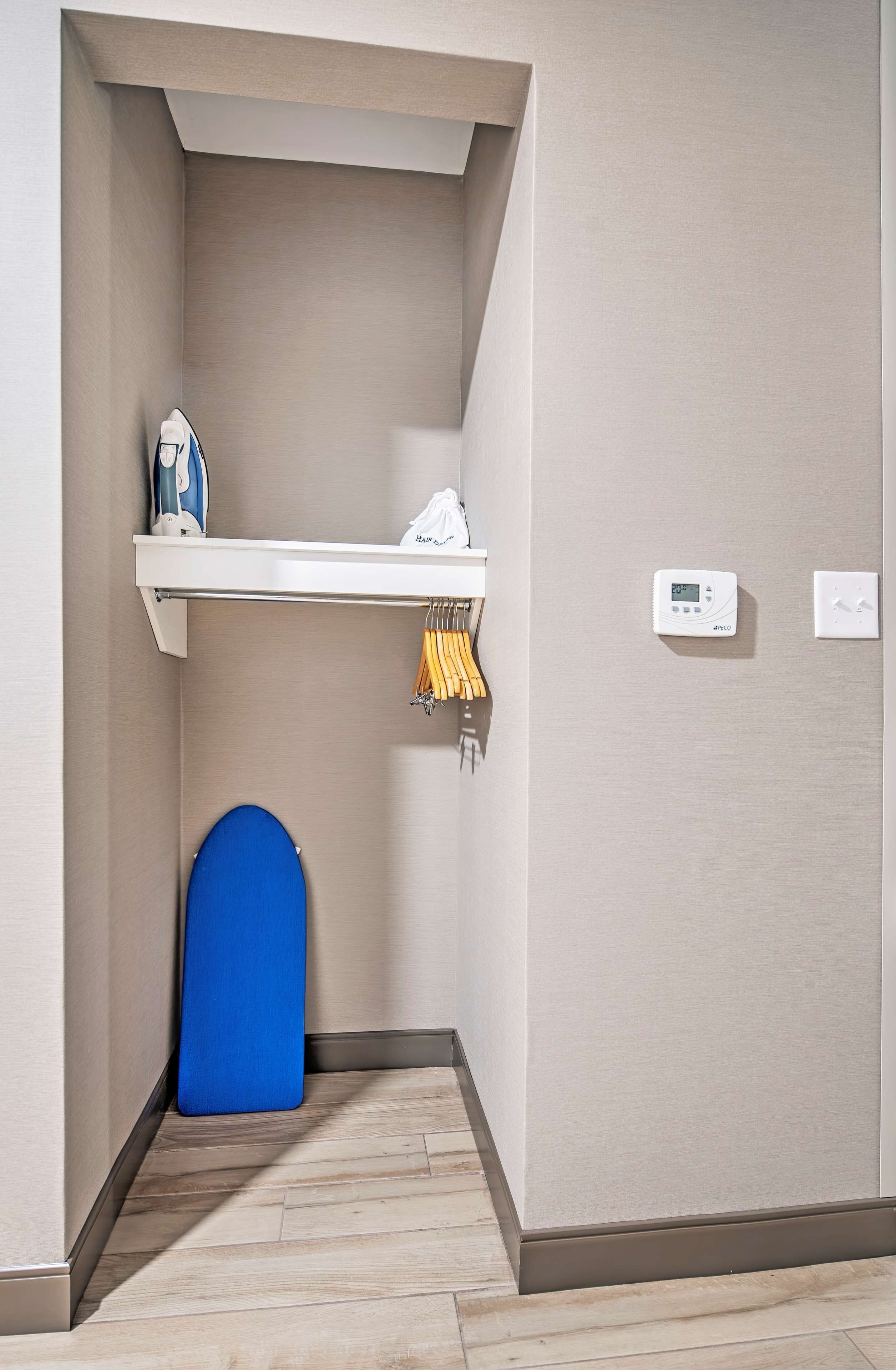 premium bedding, desk, blackout curtains, iron/ironing board