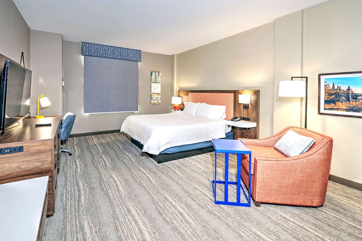 room, 1 king bed, refrigerator | premium bedding, desk, blackout curtains, iron/ironing board