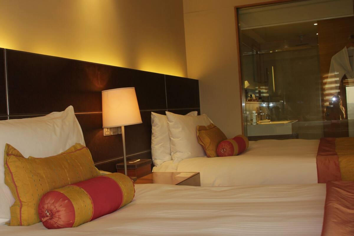 Premium bedding, down duvets, Select Comfort beds, minibar