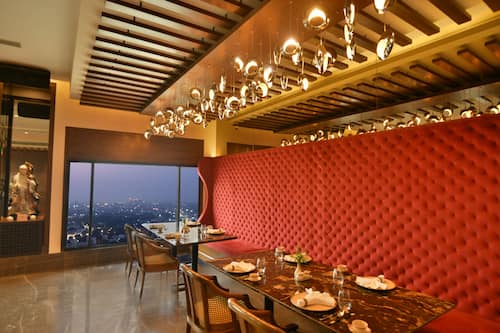 4 restaurants, breakfast, lunch, dinner served; Indian cuisine