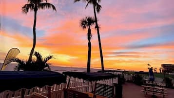 Beach nearby, white sand, sun loungers, beach umbrellas
