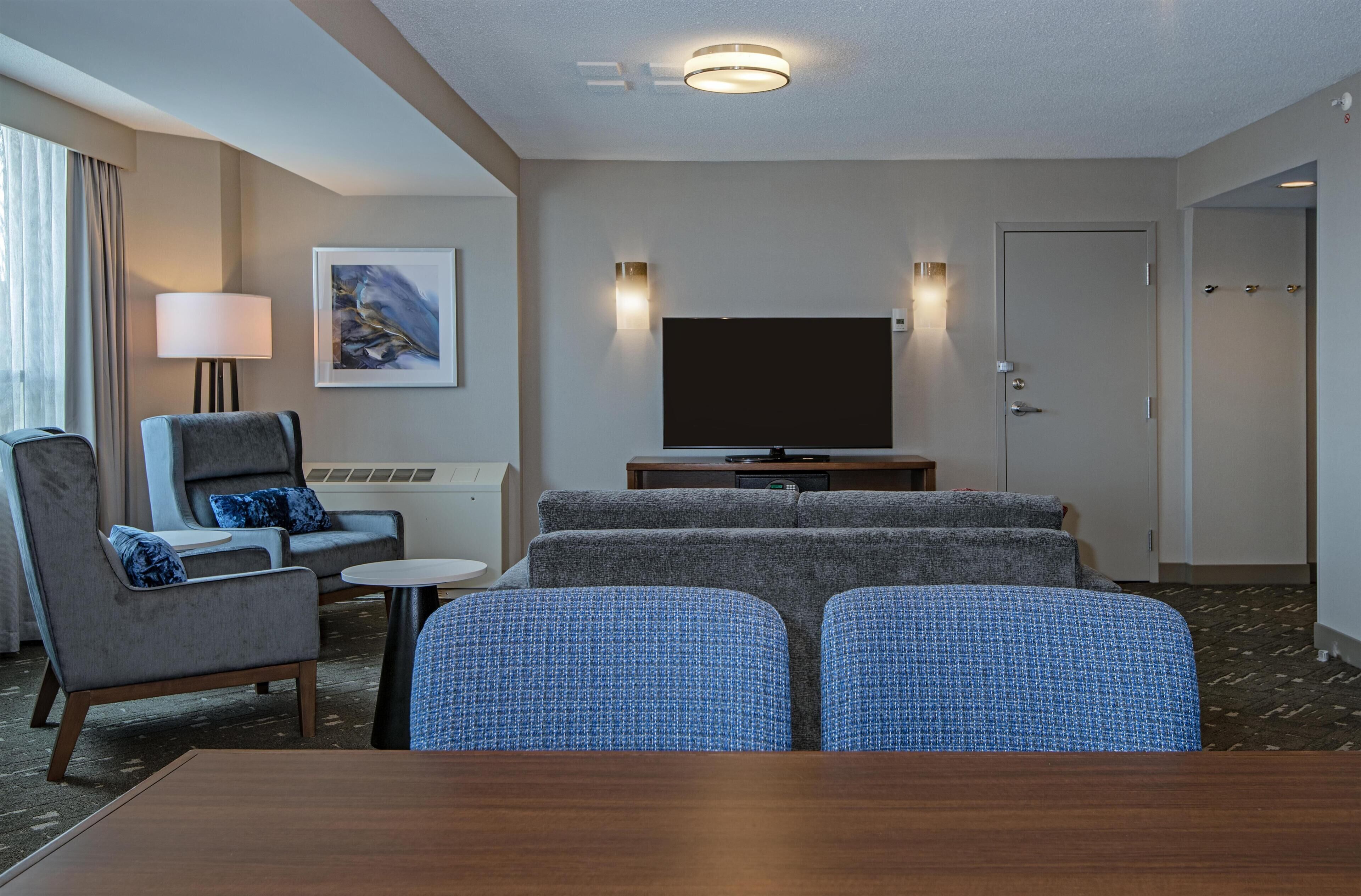 Presidential Suite, 1 King Bed | Living area | Flat-screen TV