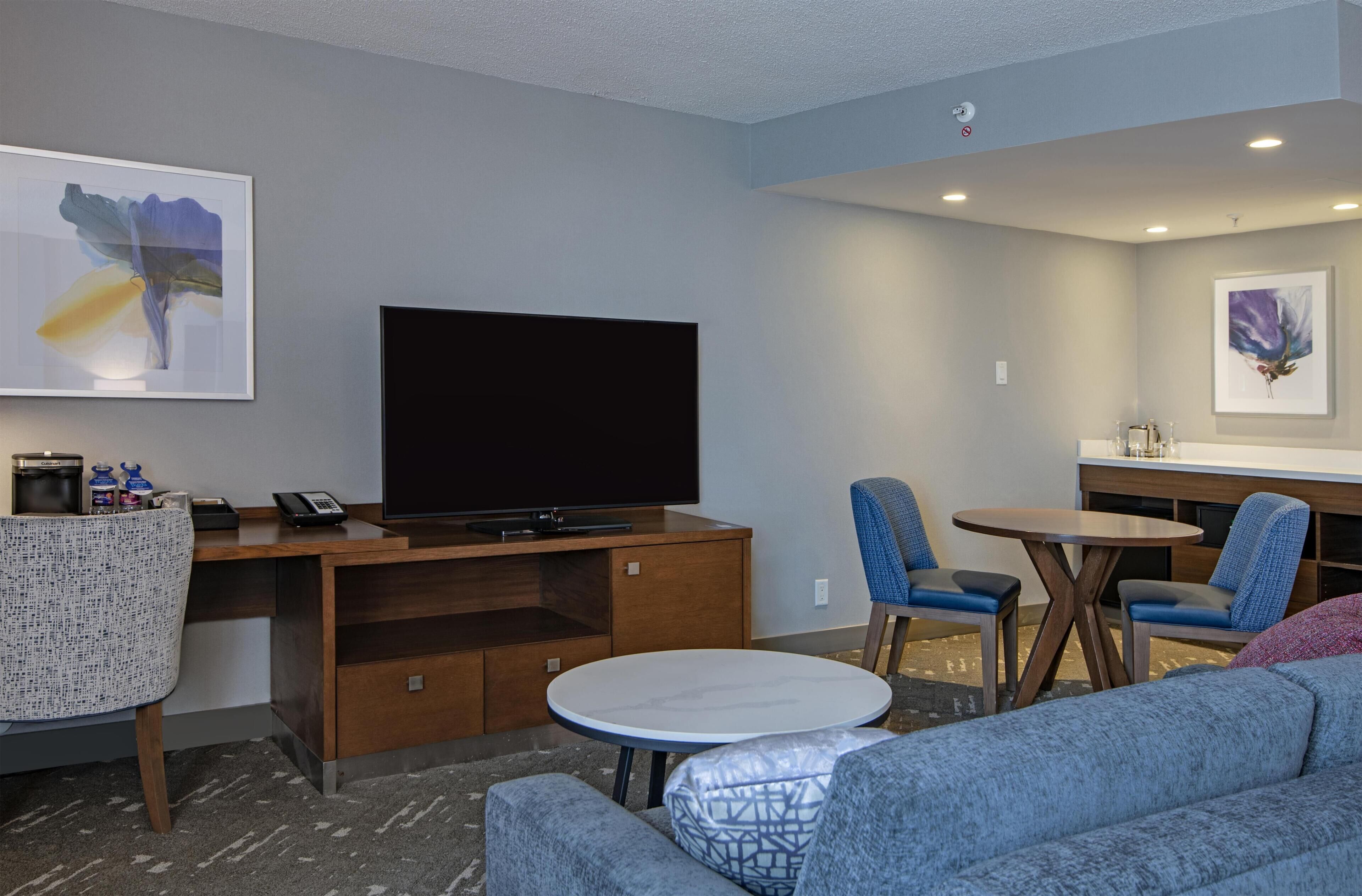 Junior Suite, 1 King Bed | Living area | Flat-screen TV