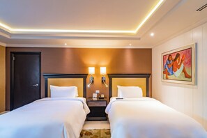 Bungalow, 2 Double Beds | Down comforters, in-room safe, desk, blackout drapes - Hotel Lucerna Mexicali (Mexicali)