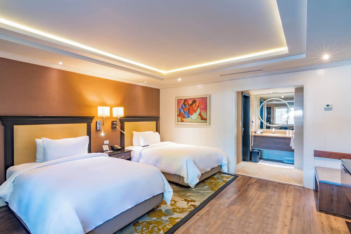 bungalow, 2 double beds | 1 bedroom, down duvets, in-room safe, desk