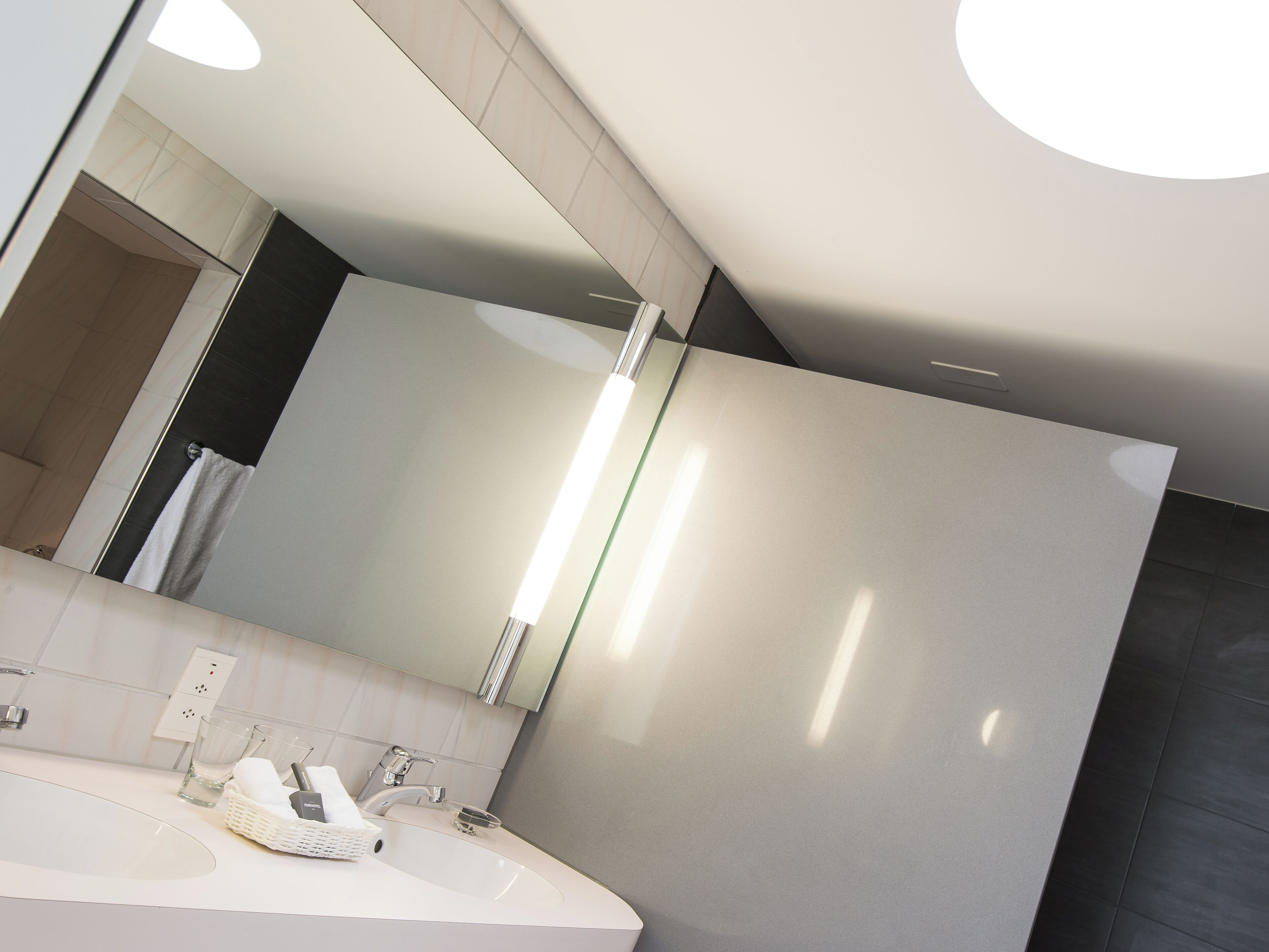 deep-soaking bathtub, designer toiletries, hair dryer, slippers