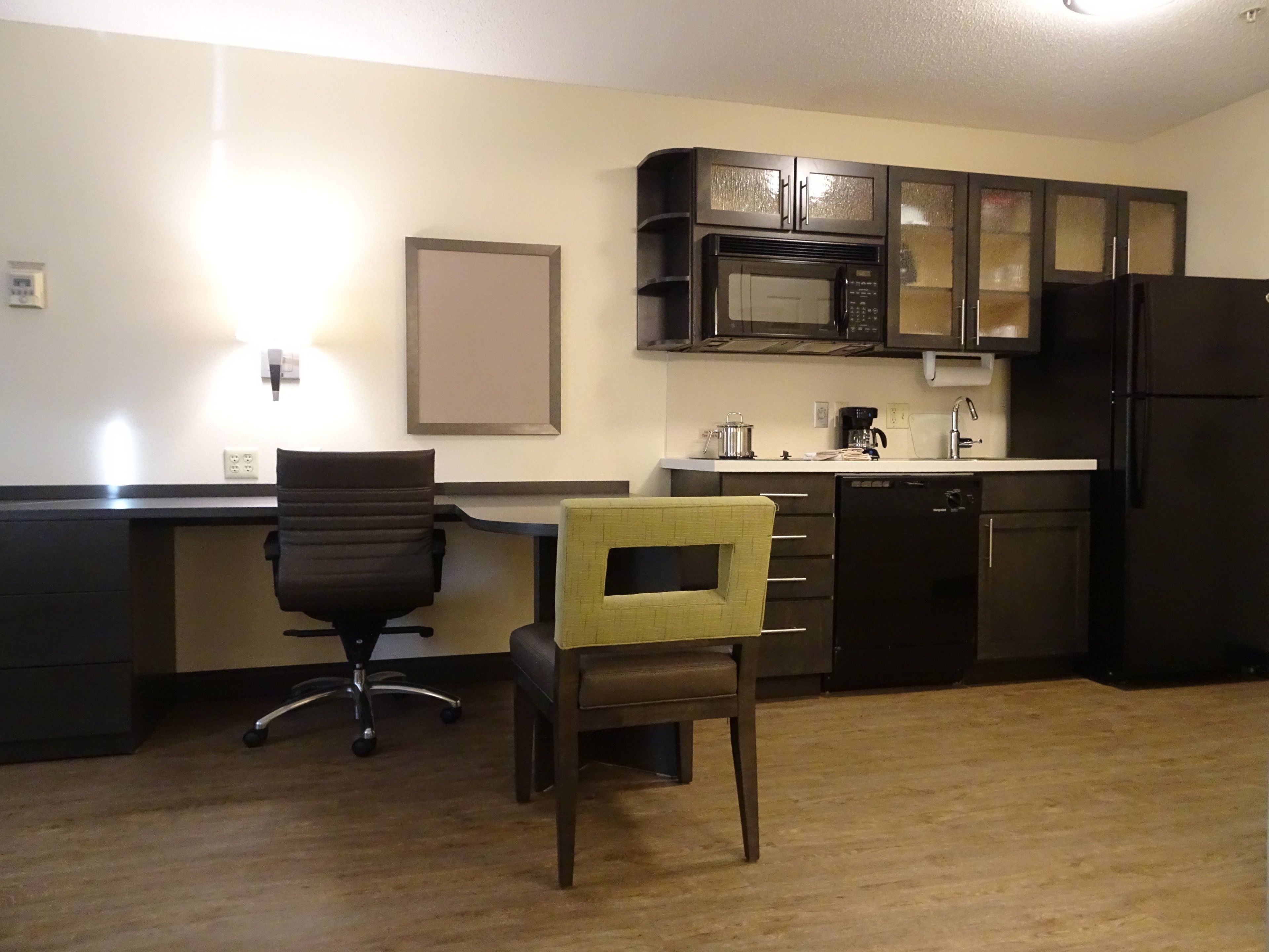 desk, laptop workspace, blackout curtains, iron/ironing board