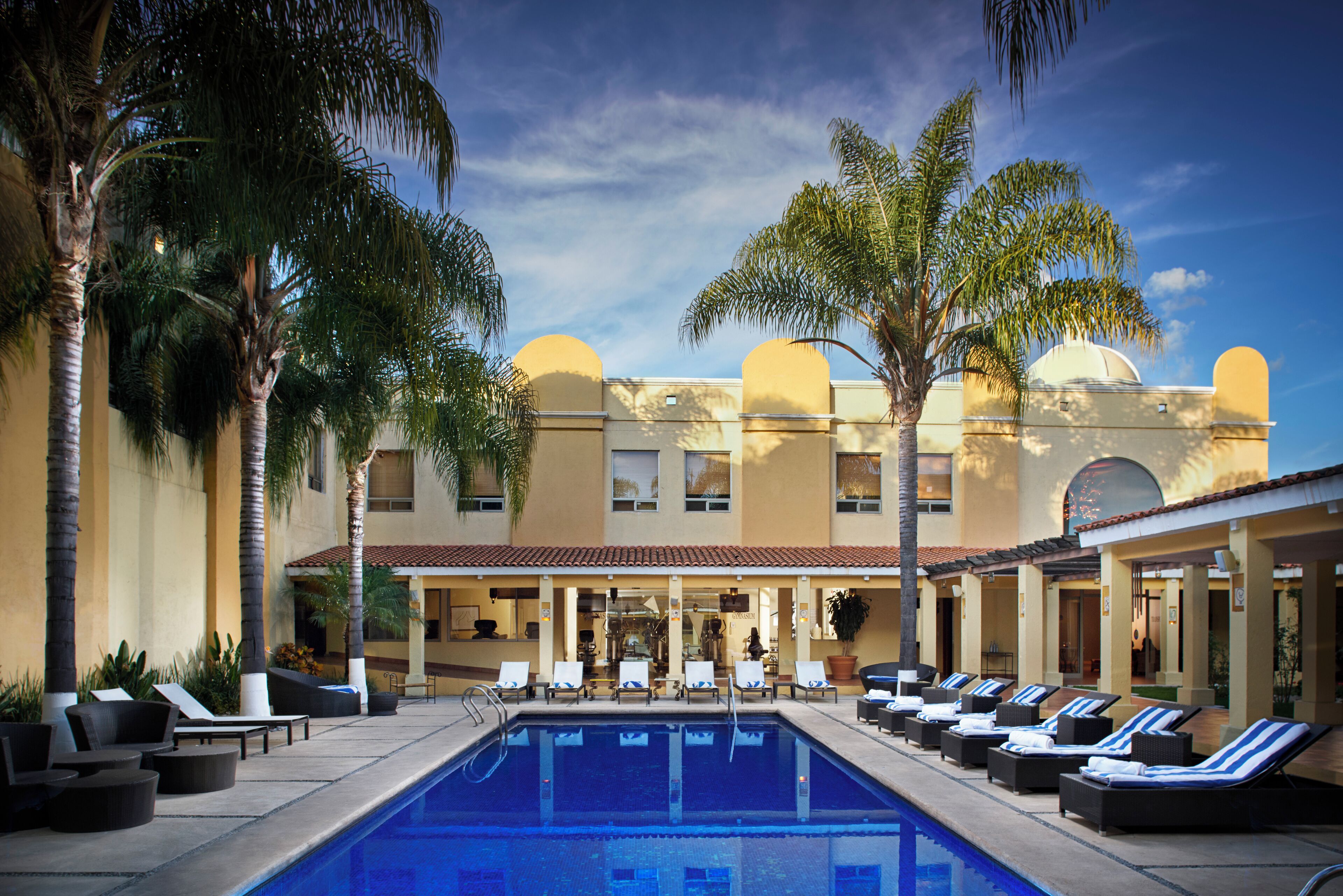 indoor pool, 2 outdoor pools, pool umbrellas, pool loungers