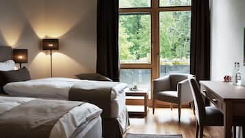Roupas de cama premium, cofres nos quartos, individualmente decorados