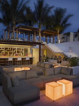 Lobby lounge, pool views, open daily at Grand Beach Hotel Surfside