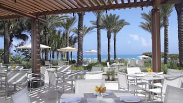 Breakfast, lunch, dinner served; international cuisine, beach views 