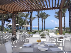 Breakfast, lunch, dinner served; international cuisine, beach views 