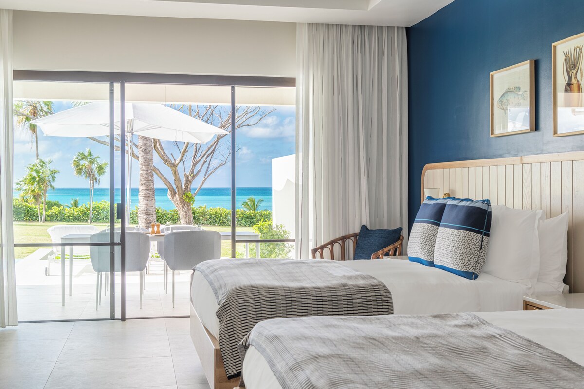 Jumby Bay Pool Cottage | Minibar, in-room safe, blackout drapes, soundproofing