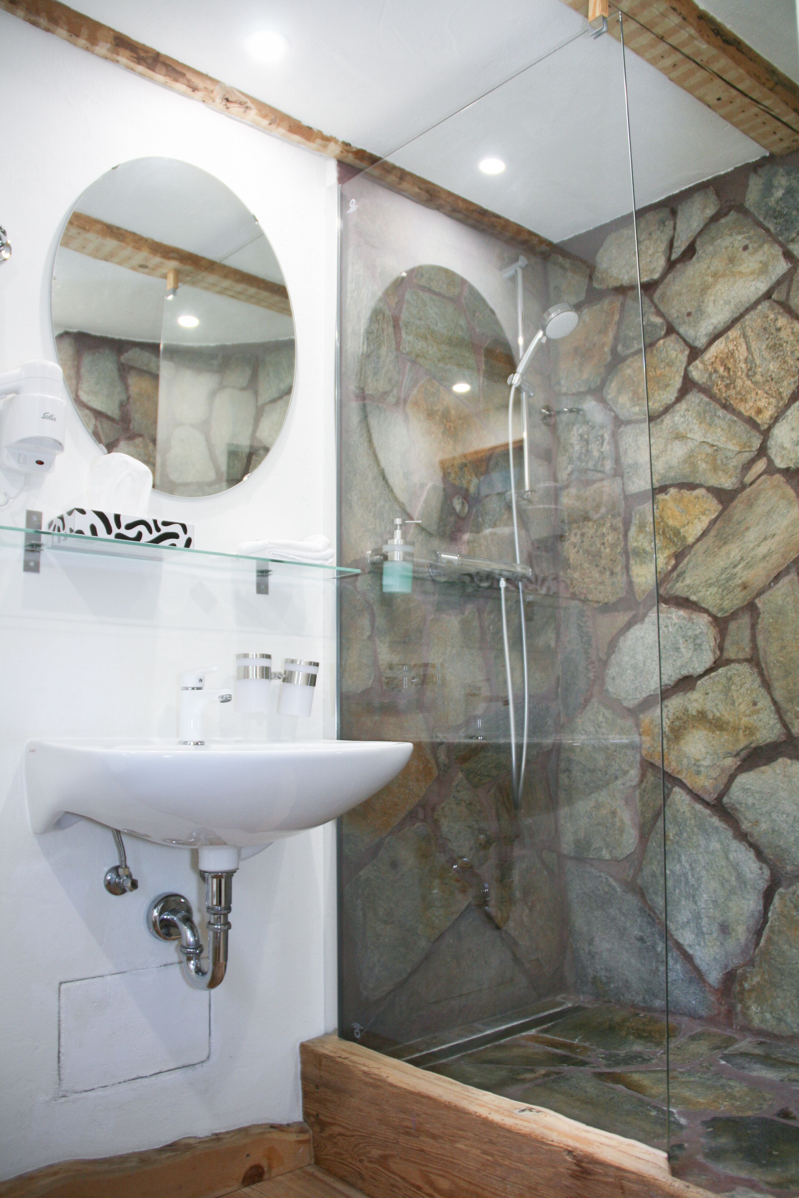 signature quadruple room | bathroom | shower, free toiletries, hair dryer, towels