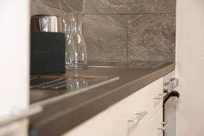 Apartment | Private kitchen - Hotel Solaria (Surses)