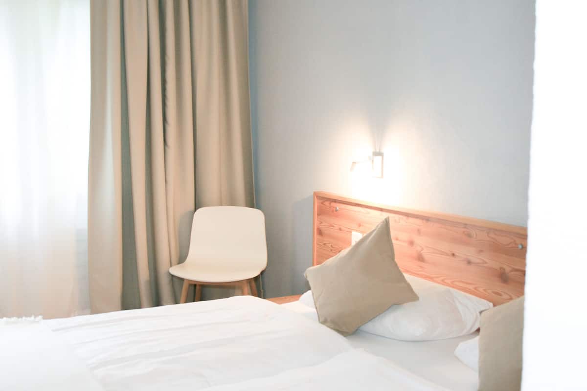 Chambre Quadruple Signature