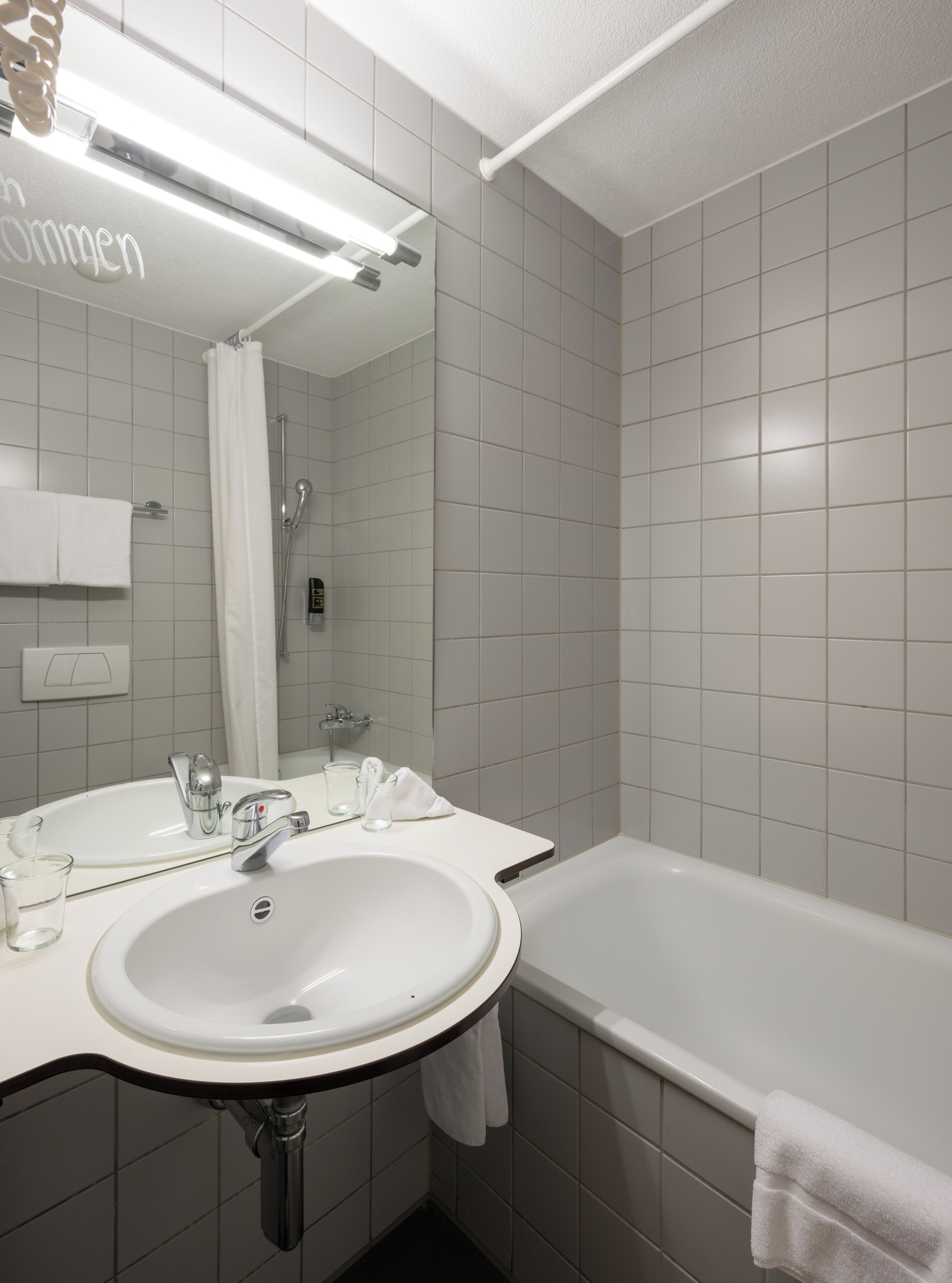 combined shower/bathtub, hair dryer, towels, soap