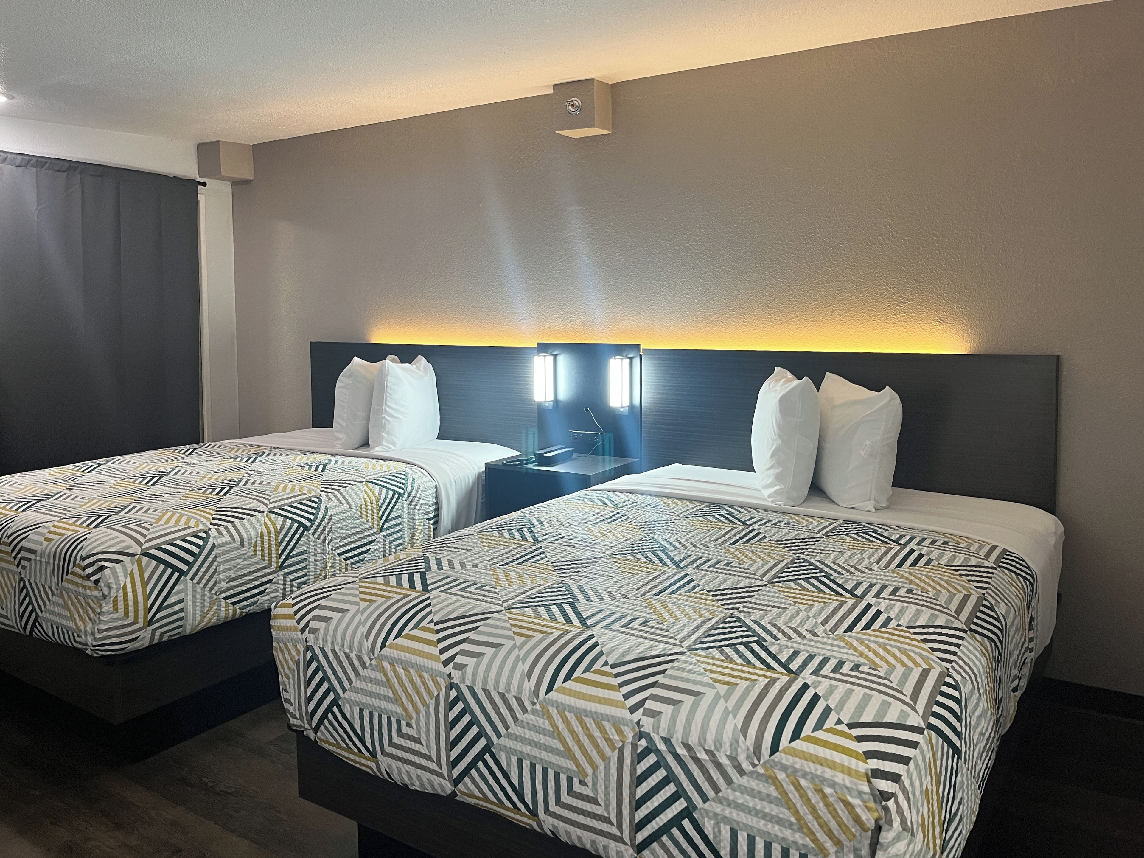 Premium bedding, blackout curtains, free WiFi, bed sheets